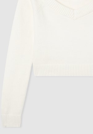 Biała krótka kurtka z dekoltem w kształcie litery V. Posiada prążkowane mankiety i dół. Tekstura przypominająca polar, miękkie wykończenie i gładkie linie w całej konstrukcji.