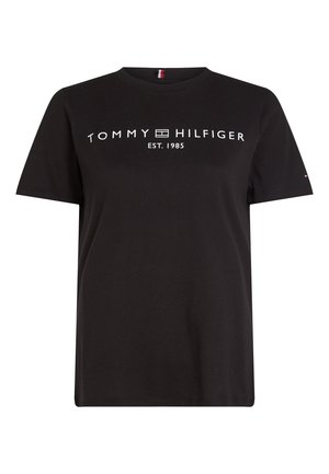 Black cotton t-shirt with short sleeves, featuring white "TOMMY HILFIGER" text and "EST. 1985" beneath. Round neckline, relaxed fit.