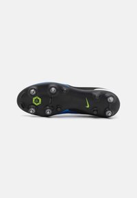 Nike football boot with a black base, blue accent, textured grip sole, and metallic studs; features a green logo on the side.