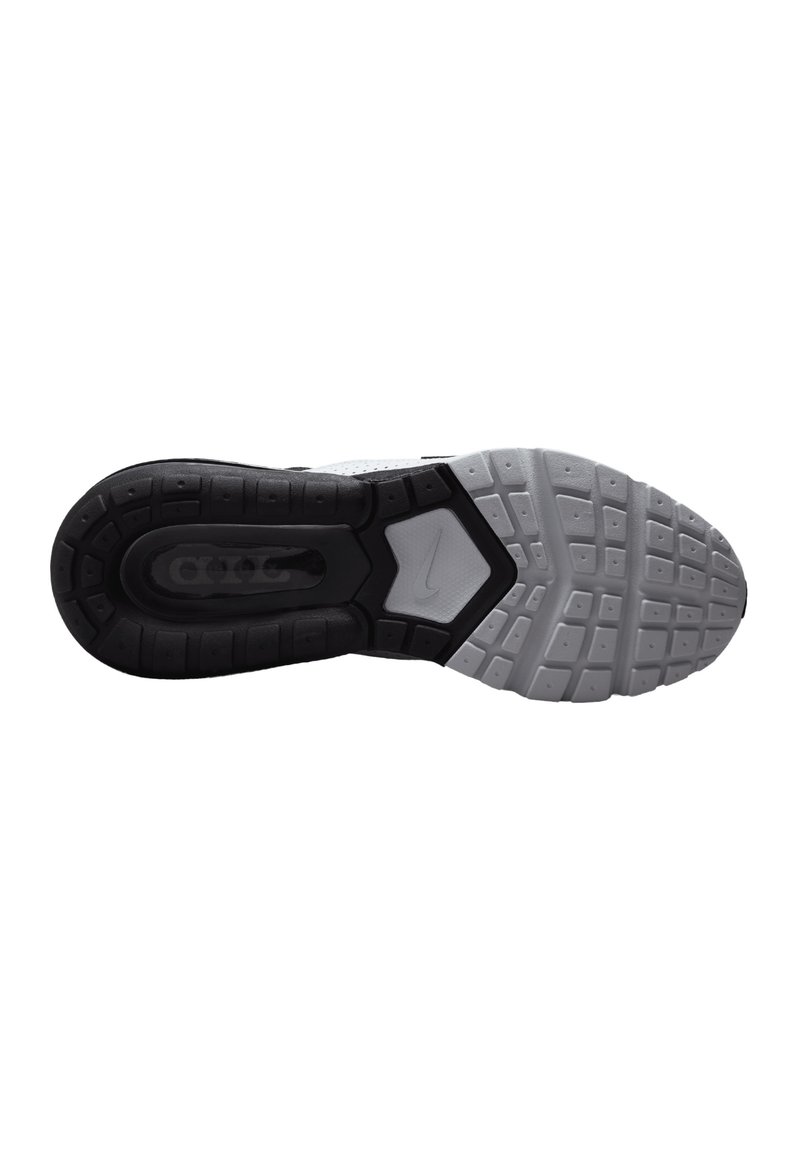 Sole di scarpa atletica nera e grigia con diversi modelli di battistrada, una sezione centrale liscia e logo Nike. Presenta una costruzione in gomma durevole.