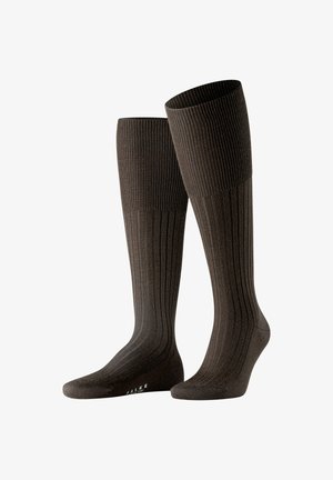 Braune kniehohe Socken mit vertikaler Rippstruktur und verstärktem Zehenbereich. Weiches Material und enger Sitz, geeignet für formelle oder legere Kleidung.