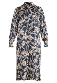 Mörkblå blommig klänning med långa ärmar och en rosett vid halsen. Har en flödande silhuett och mönstrad tyg i beige nyanser. Sidoklipp finns.