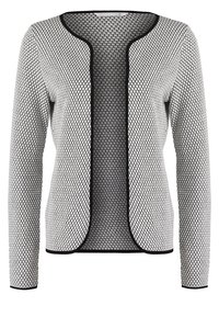 Cardigan blanc et noir à ouverture devant avec motif nid d’abeille et bordure noire au col, aux bords devant, aux poignets et à l’ourlet.