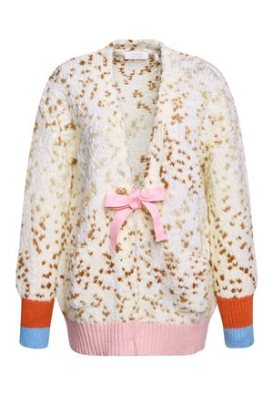 Knit cardigan in cream with brown speckles, featuring a deep V-neck, pockets, and a pink bow accent; ribbed cuffs in orange, pink, and blue.