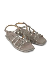 Sandalias de ante gris con tiras adornadas con brillantina, hebilla en el tobillo y una suela plana brillante.