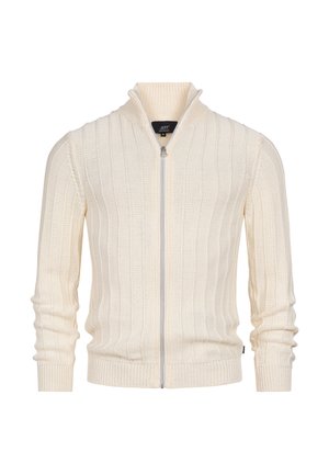 Crèmekleurige gebreide trui met rits, met een geribbelde structuur, opstaande kraag en lange mouwen. Voorzien van een zilverkleurige ritssluiting en subtiele branding.