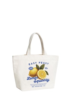 Canvas tote bag with lemons and text "Easy Peasy Lemon Squeezy" in blue, featuring lemon slice and green leaves illustration.