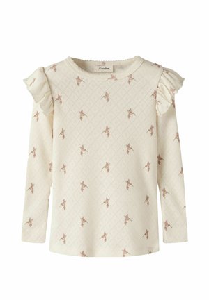 T-shirt crème à manches longues pour tout-petit avec motif floral rose, épaules volantées et texture subtile en diamant, étiqueté Lil' Atelier.