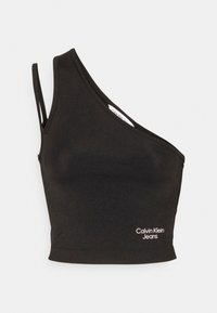 Crop top nero asimmetrico realizzato in un tessuto liscio, con spalline sottili e un logo stampato "Calvin Klein Jeans" sulla parte anteriore.
