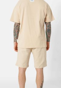 Sixth June ESSENTIEL - Tracksuit bottoms - beige