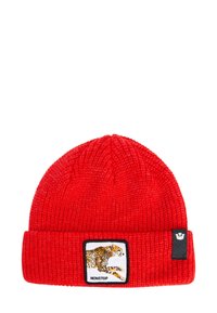 Rote gestrickte Mütze mit umgeschlagenem Saum, die einen gestickten Patch eines rennenden Leoparden und das Wort "NONSTOP" in einem schwarzen Rahmen zeigt.