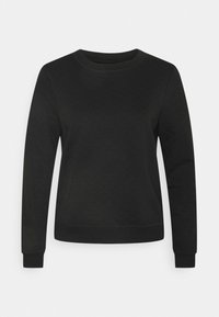 Sweat-shirt noir à texture matelassée, col rond et manches longues. Poignets et ourlet côtelés apportent de la structure au design.