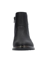 Black ankle boot with a smooth synthetic material, side zipper, round toe, and contrasting stitching along the sole.