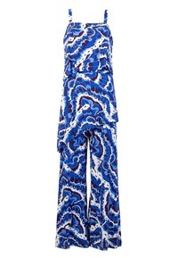 Blå och vit mönstrad overall med spaghettistövlar, lagerdesign och vida byxor, med en flytande, mjuk tygttextur.