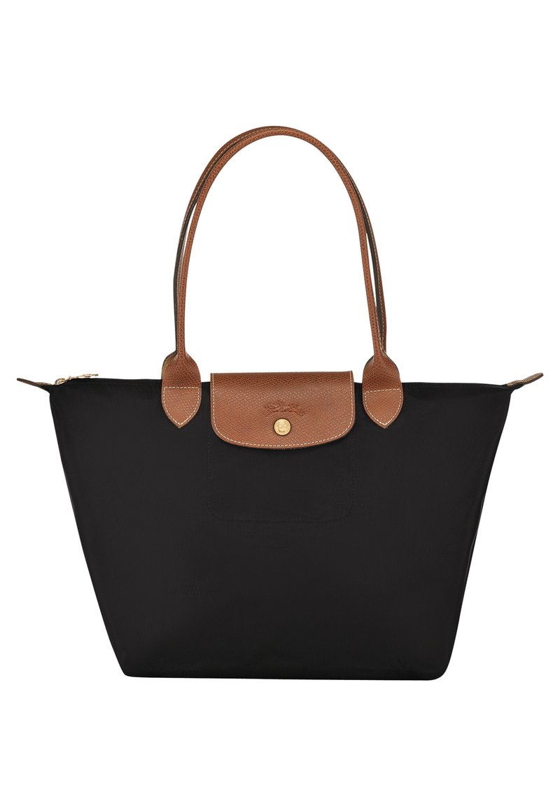 Black nylon tote bag with brown leather accents and handles. Features a snap closure and a front pocket with a logo detail.