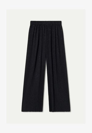 Pantalones de pierna ancha negros con cintura elástica, que presentan un diseño texturizado de canalé y delicados destellos metálicos en toda su superficie.