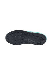 Black rubber sole with textured grip pattern and turquoise side accents. Durable material designed for stability and comfort.