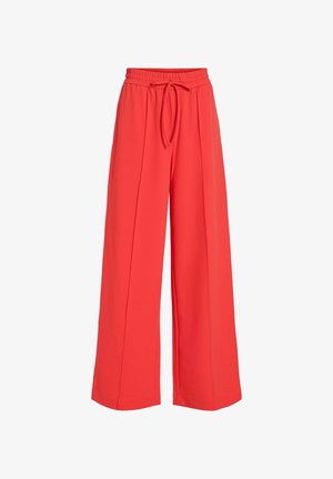 Pantalon rouge à jambes larges en tissu léger, avec une ceinture élastique à cordon de serrage et des plis sur le devant pour plus de détails.