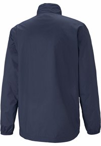 Navy blue long-sleeve jacket with elastic cuffs and a high collar, shown from the back on a white background.