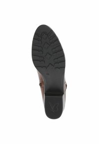 Stivale in pelle marrone con suola in gomma nera testurizzata, caratterizzata da un motivo a fiori e un logo sul tallone. L'angolo mostra la suola da vicino.