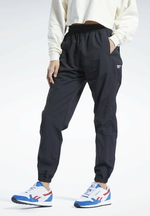 FRANCHISE - Pantalones deportivos - black