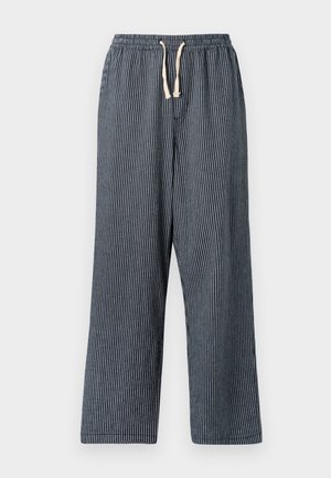 Striped navy blue pants with an elastic waistband and drawstring, featuring side pockets and a straight-leg cut. Cotton fabric texture.