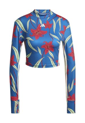 Haut court bleu à manches longues avec imprimé floral rouge, col haut, et logo Adidas blanc centré près de l'encolure.