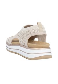 Beige gestrickte Sandale mit offenem Rücken, gepolsterter Innensohle und dicker weißer Zwischensohle. Verfügt über ein Ausschnittdesign und eine strukturierte Oberseite.