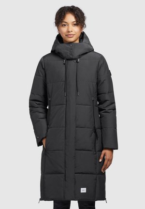 Black puffer coat with a hood, quilted design, zippered side pockets, adjustable drawstring closure, and a branded label on the hem.