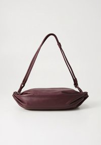 Burgundy leather crossbody bag with a curved silhouette, adjustable strap, and pleated details along the edges. Smooth texture throughout.