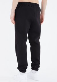Megaman BASIC JOGGING - Jogginghose - schwarz