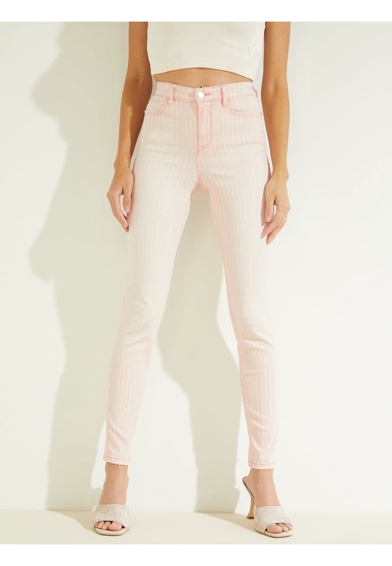 Svetle růžové skinny džíny s vysokým pasem, vertikálními bílými pruhy, pětibodovým designem a předním zapínáním na knoflík. Hladká denimová textura.