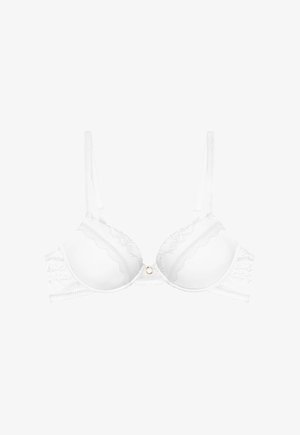 Hvid blonde-padded bh med justerbare stropper og en lille rund metal detalje foran i midten.