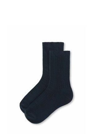 Paire de chaussettes bleu foncé texturées, longueur mi-mollet, présentée à plat sur fond blanc.