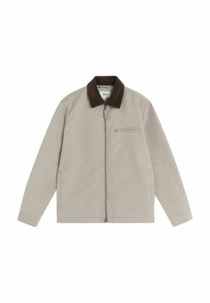 Lys beige jakke lavet af bomuld, med en brun fløjlskrage, lynlås lukning og sidelommer. Enkel design med minimal detaljer.