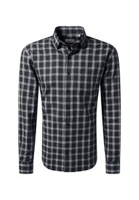 Camicia a maniche lunghe a quadri bianco e nero con colletto, esposta su uno sfondo bianco semplice.
