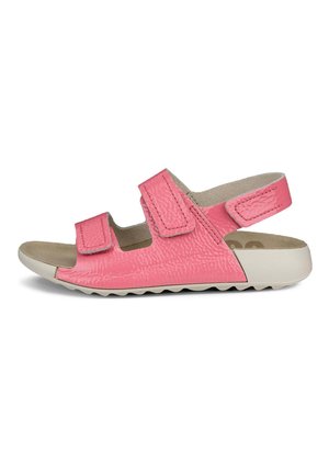 Rosa sandaler med en tekstureret overflade, der har to justerbare Velcro-stropper, åben tå-design og en hvid gummisål med et bølget mønster.