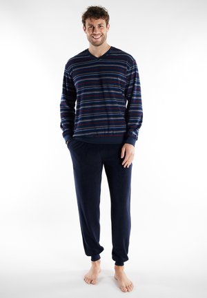 Marineblau gestreiftes Loungewear-Set mit einem V-Ausschnitt und langem Ärmel sowie passenden weichen Jogginghosen mit Bündchen. Hergestellt aus einem gemütlichen Material.