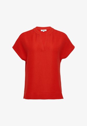 Haut rouge à côtes avec un col en V et des manches courtes. Dispose d'un tissu texturé et d'une coupe décontractée. Pas de logos visibles ni de détails supplémentaires.