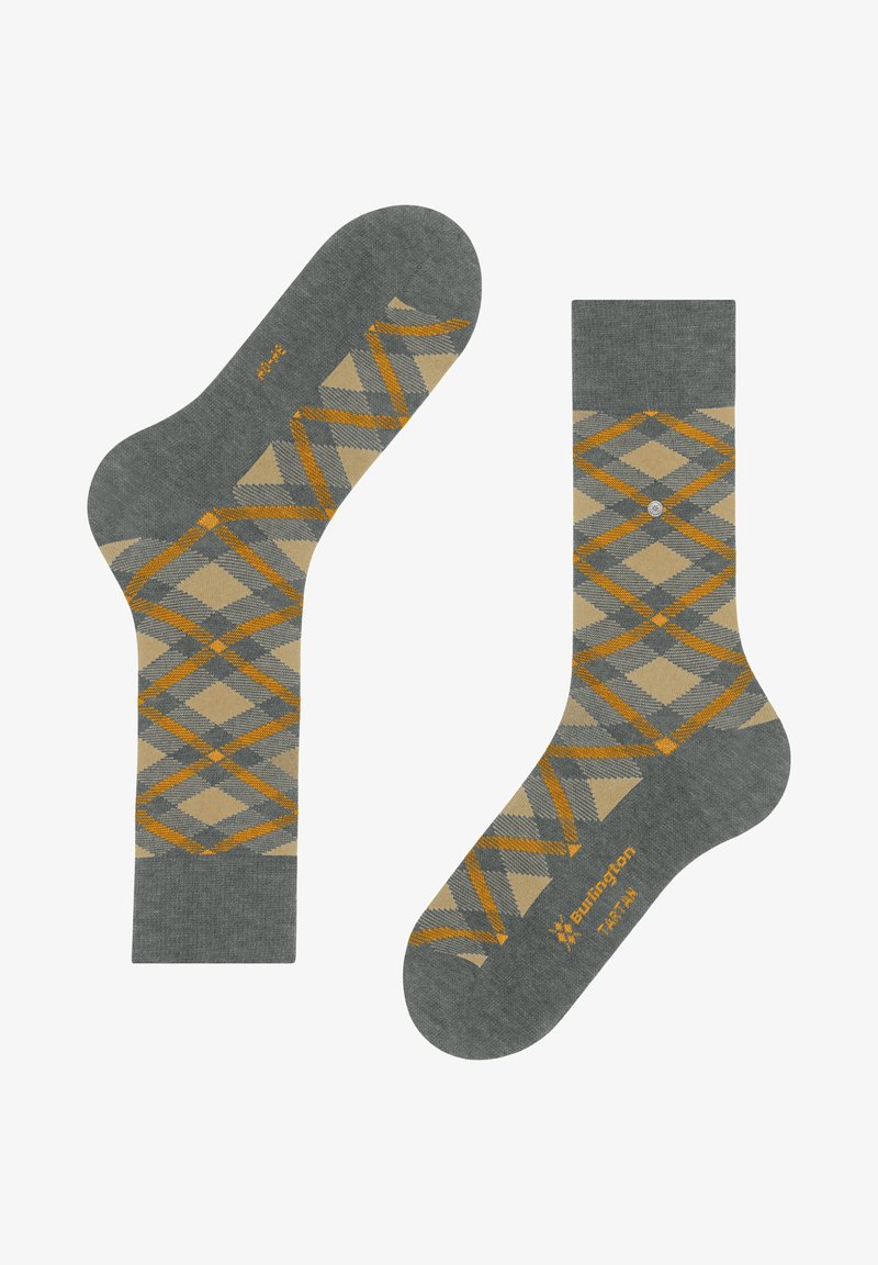 Chaussettes grises à motif losange en beige et orange, réalisées dans un matériau texturé, avec un détail logo près des orteils.