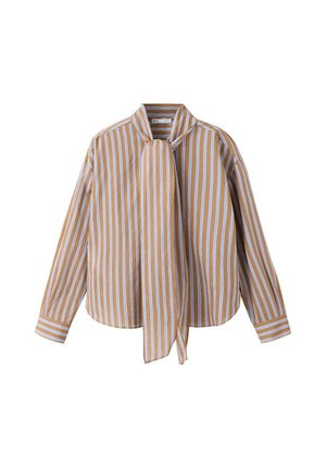 Blouse à manches longues beige et blanche à rayures verticales, avec un nœud au col devant et des poignets boutonnés sur fond blanc.