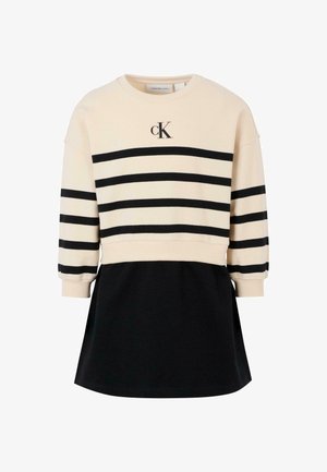 Abito a maglia a righe crema e nero con logo, in morbido misto cotone, collo rotondo e maniche lunghe, dotato di una gonna nera.