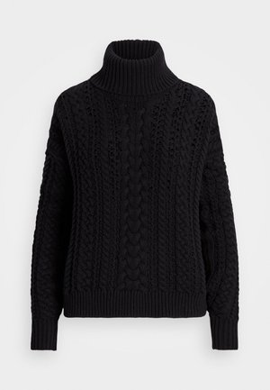 Stickad tröja - black