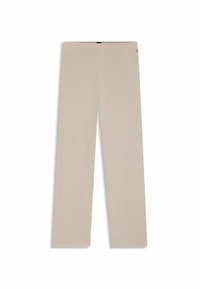 Beige wafelgebreide wijde broek met een elastische tailleband, platgelegd op een witte achtergrond.