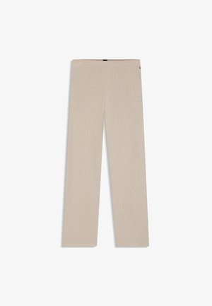 Pantalons larges en tricot gaufré beige avec une taille élastique, posés à plat sur un fond blanc.