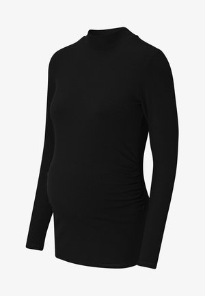 Schwarzes, langärmeliges Umstandshirt aus geripptem Stoff. Mit einem hohen Kragen und gerafften Seitendetails für eine anpassbare Passform über dem Babybauch.