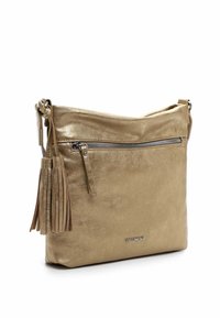 Metallic gold leather crossbody bag with a zippered front pocket, decorative tassel, and logo accent. Smooth texture and minimalist design.