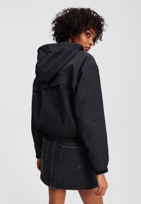 Karl Lagerfeld Jeans Lengva striukė - black