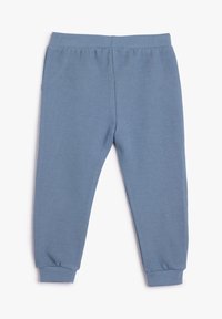 Weiche, gerippte, hellblaue Jogginghosen mit schmalen Bündchen und einem elastischen Bund. Entwickelt für Komfort und Bewegungsfreiheit.
