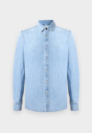 Light blue denim shirt with long sleeves, a button-down front, and a classic collar. Features a smooth texture and stitched accents.